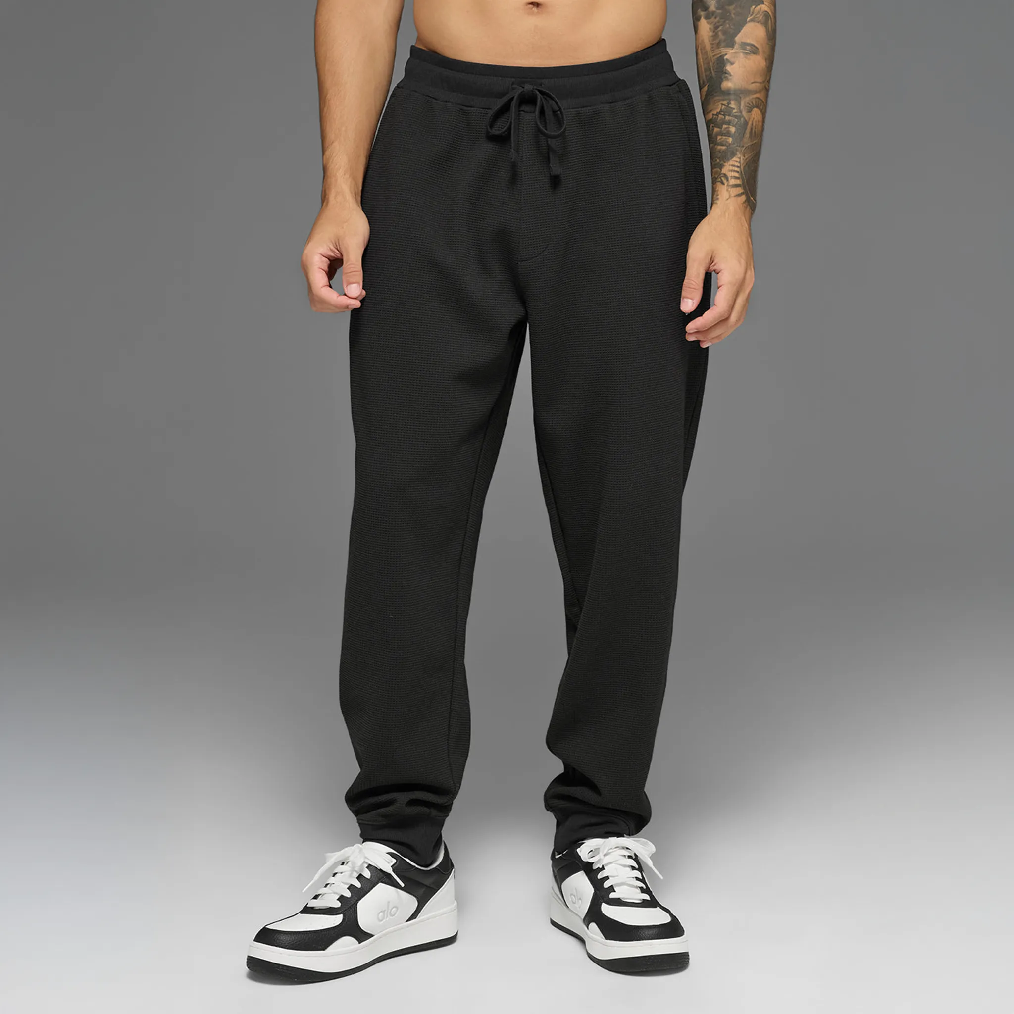 Front View of Alo Yoga Waffle Lounge Black Sweatpants